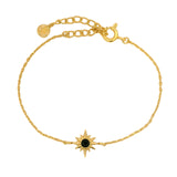 Bracelet doré rose des vents et onyx noire