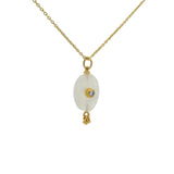 Gold necklace with unset stone, tassels and zircon