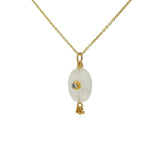 Gold necklace with unset stone, tassels and zircon