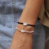 Bracelet doré cordon bleu marine cauri naturel