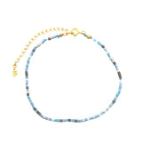 Chaine de cheville dorée et perles bleues et grises