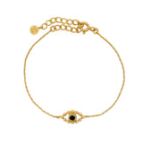 Bracelet doré oeil contour boules et Onyx noire