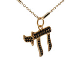 Collier doré avec Hai en zircons noirs 50 cm