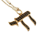Collier doré avec Hai en zircons noirs 50 cm