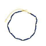 Chaine de cheville dorée en lapis et onyx noir