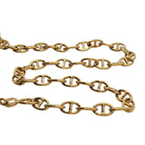 Gold ankle bracelet with round navy mesh