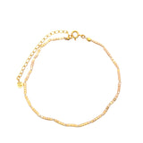 Chaine de cheville dorée en perles beiges et blanches