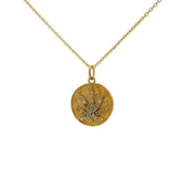 Collier doré médaille feuille de chanvre zircons 42 cm