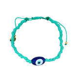 Turquoise cord bracelet and blown glass eye