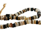 Chaine de cheville dorée disques de coquillage