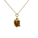 Collier doré tête de mort beige taillée dans de l'os 42 cm
