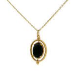 Golden necklace with swivel cabochon stone pendant
