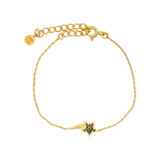 Bracelet doré étoile filante avec zircons noirs