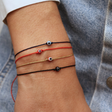 Bracelet fil fin coloré et oeil porte bonheur