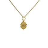 Collier doré médaille soleil infini et zircons blancs