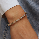 Bracelet doré en pierres taillées en disques Heishi