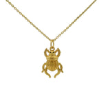 Collier doré pendentif scarabée zircons noirs 42 cm
