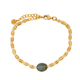 Bracelet doré labradorite ovale facettée et disques dorés
