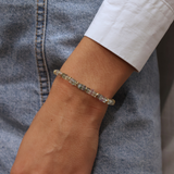 Bracelet doré en pierres taillées en disques Heishi