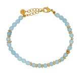 Bracelet doré en agate bleu et disques dorés