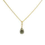 Gold necklace and faceted drop stone