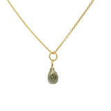 Gold necklace and faceted drop stone