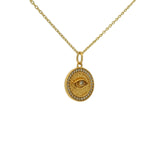 Gold necklace with eye stone and zircon medal