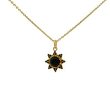Collier doré soleil onyx noire cabochon zircons noirs 42 cm