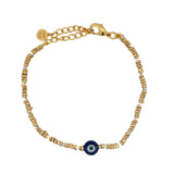 Bracelet doré avec petit oeil bleu et perles dorées martelées