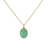 Collier doré scarabée onyx verte zircons 42 cm