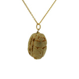 Collier doré gros scarabée bois beige 42 cm