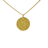 Gold necklace and flower medal