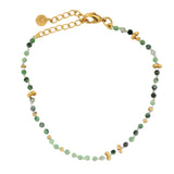 Bracelet with small ball and gold stones