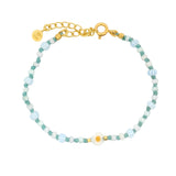 Bracelet doré petite marguerite entourée de perles miyuki bleues