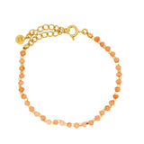 Bracelet doré en pierre de lune orange et boules dorées