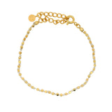 Bracelet doré noeuds en cordon beige avec perles dorées