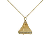 Gold necklace with bell pendant, zircons and stone