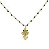 Collier doré onyx noire poisson zircons blancs et noirs 44cm