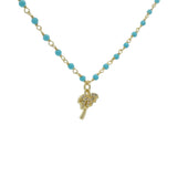 Collier doré rosary turquoise et palmier 42 cm
