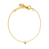 Bracelet doré petit zircon blanc rond serti clos