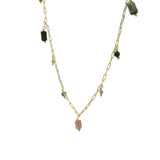 Golden necklace with rectangular mesh and stone tassels