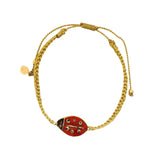 Bracelet doré cordon tressé avec coccinelle