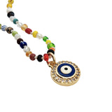 Collier doré perles multicolores oeil bleu zircons 38 cm