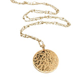Gold necklace with medal engraved with leaves and "LUCKY YOU"