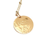 Gold necklace with medal engraved with leaves and "LUCKY YOU"