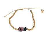 Bracelet cordon torsadé doré avec poisson violet