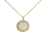 Gold necklace with oval stone pendant and balls