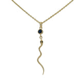 Gold necklace with snake and stone pendant