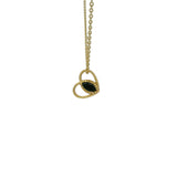 Gold necklace with hollow heart pendant and heart