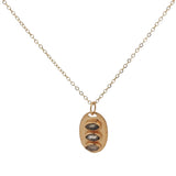 Golden necklace oval pendant trilogy of stones
